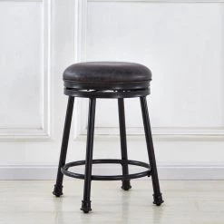 Claire 24 in. Black Base with Brown seat Swivel Counter Stool by Steve Silver 13 Claire 24 in. Black Base with Brown seat Swivel Counter Stool by Steve Silver -Steve Silver Online Store black steve silver bar stools cr540cs 4f 1000