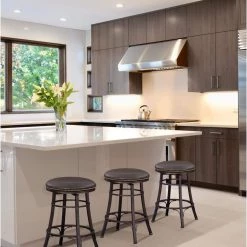 Bali 24 in. Metal Backless Swivel Barstool with Bonded Leather Seat by Steve Silver -Steve Silver Online Store metal steve silver bar stools bl500scc 31 1000